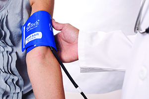 putting on a blood pressure cuff